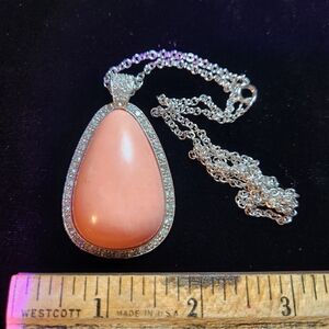 Elegant Silver and Pink Pendant Necklace